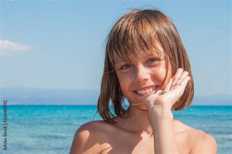 nude beach girls|1,175 Young Naturism Stock Photos & High